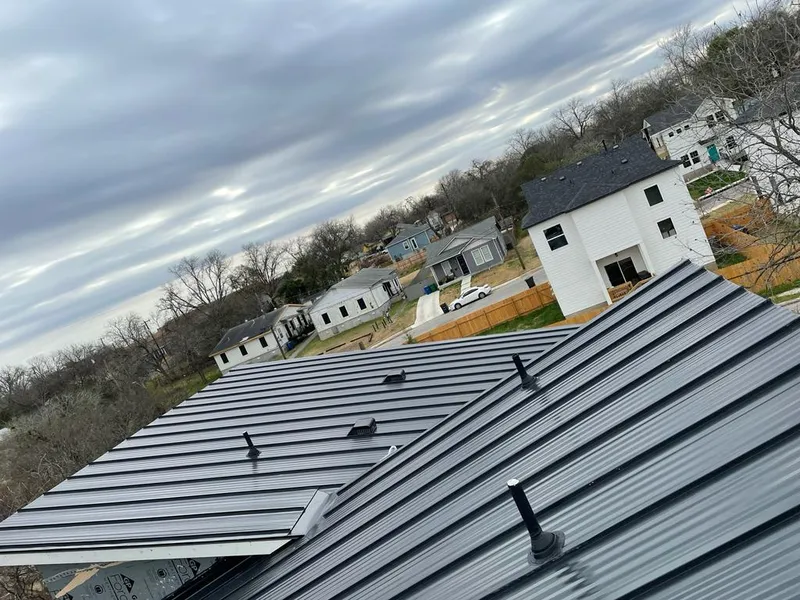 Standing seam metal roof panels with vents for Skylight Repair in Huron